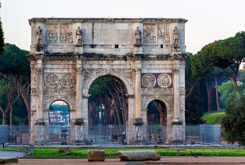 Arch of Constantine and coliseum in background at Rome, Italy
