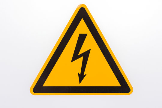 Warning sign High voltage yellow triangle isolated on white