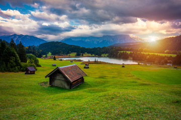 Panoramic morning scene of Wagenbruchsee (Geroldsee) lake with Zugspitze mountain range on...