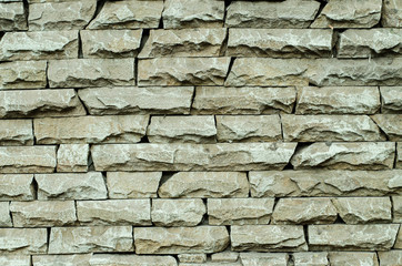 Brick wall of an old building. The structure of the stone. Brickwork. Stone wall.