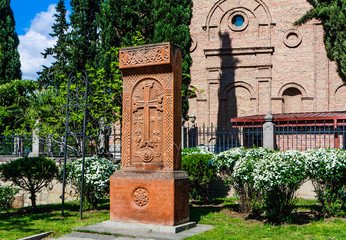 Fototapeta na wymiar Khachkar at the Ejmiatsin Church of Armenian Apostolic church, located in Avlabari District, Tbilisi, Georgia.
