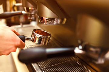 Barista cafe making coffee. Coffee machine preparing fresh coffee and pouring into cups at restaurant, bar or pub. Professional coffee brewing. Preparation service concept.