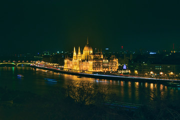 Fototapeta premium Hungarian Parliament illuminated at night in Budapest, Hungary