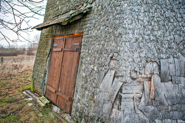 Gates and body made of aspen shingles of a windmill. Village Zaval. Novgorod region. Russia