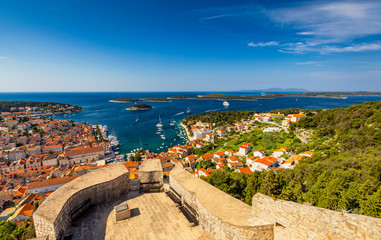 View at amazing archipelago in front of town Hvar, Croatia. Harbor of old Adriatic island town Hvar. Popular touristic destination of Croatia. Amazing Hvar city on Hvar island, Croatia.