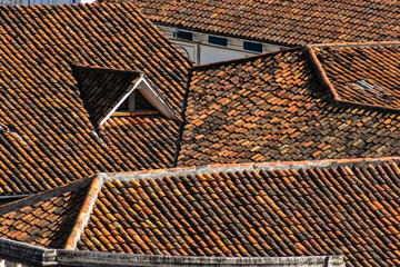 Traditional houses in Cuenca with red tile roofs