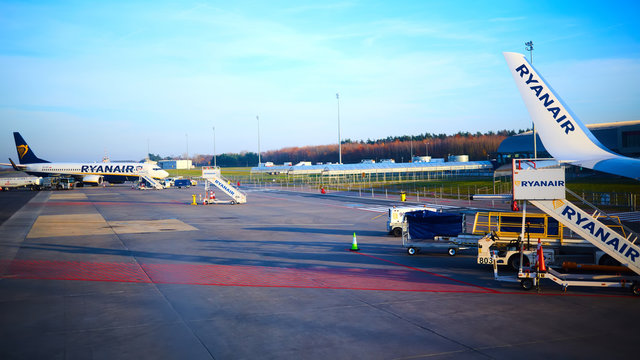  Preparing for boarding to Ryanair plane in Warsaw Modlin airport in Poland. Ryanair operates over 300 aircraft and is the biggest low-cost airline company in Europe.