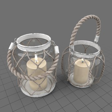 Lit candles with glass holders