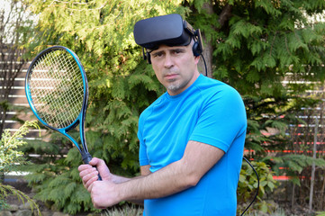 man with virtual reality headset and tennis racket before a game and ready experience the computer-generated simulation on a summer day