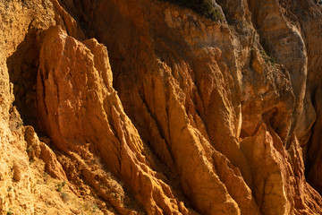Ponta da Piedade cliff rock sand details in Lagos, in Portugal