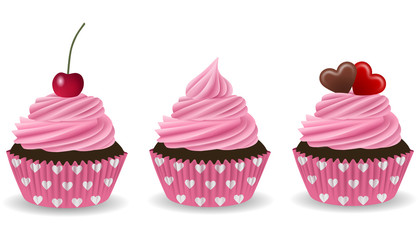 set pink cupcakes with cherry and hearts for valentine's day 
