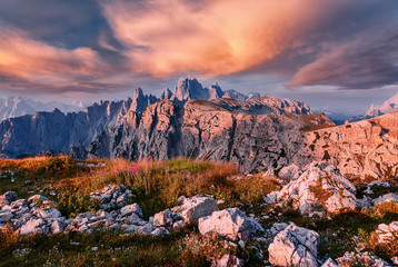 Wonderful nature landscape with colorful sky in spring. Awesome Dolomites Alps during Sunset....