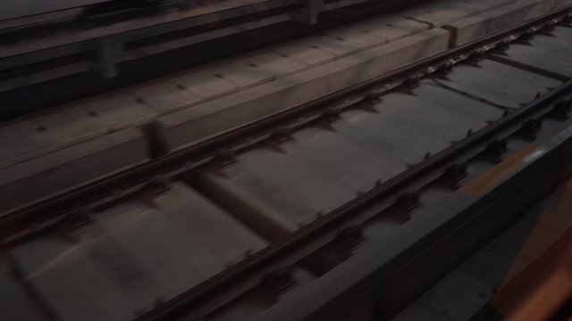 Electric train track from accelerating train's window