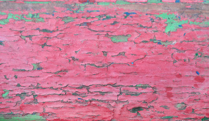 red old peeling paint on an old
