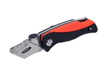 Cutter knife isolated. Close-up of a proffessional utility knife for laying carpets isolated on a white background. Macro photograph of a carpet artisan tools.