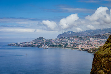 Fototapeta na wymiar Panoramic view over Funchal the capital of Madeira fom a viewpoint, Madeira island, Portugal