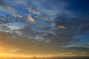 Obraz na płótnie Canvas Seascape with a vibrant sunset over a calm sea