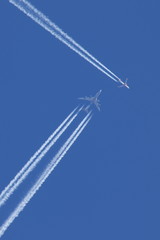 Airplane in the blue sky