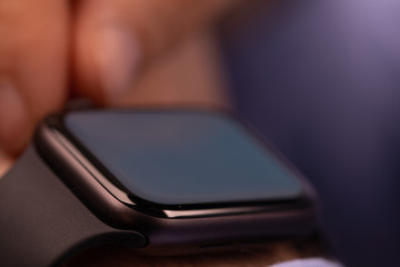 Close up of Businessman's hand looking at hand watch