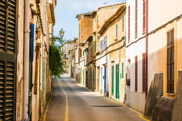 Fototapeta na wymiar Narrow street of the Arta city, Mallorca