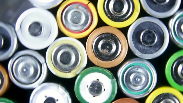 Used batteries from different manufacturers. collection and recycling, high danger for environment concept