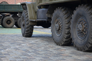 Close up of green military truck. Modern military transportation vehicle technologies