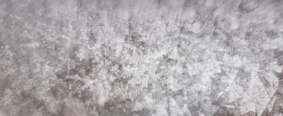 Fototapeta premium Gray background with white peeling crackled paint grunge in old vintage background banner design with soft blur bokeh effect