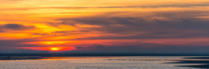 Crépuscule sur la baie de Somme, à marée basse face au Crotoy