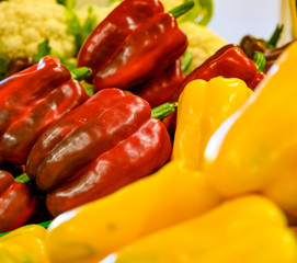 Fresh big red and yellow sweet paprika for sale on Sunday farmers market on Tenerife, Canary islands, Spain