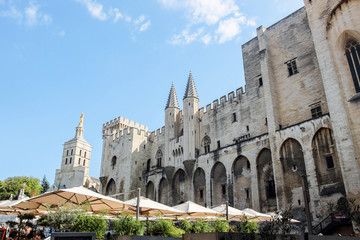 Fototapeta premium exterior facade of Palais des papes with blue sky in Avignon