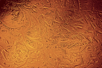 golden ice background, abstract yellow background, cold seasonal unusual ice, holiday texture