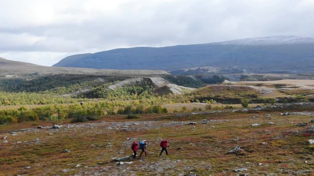 Hikers trekking across the wilderness nature of sweden