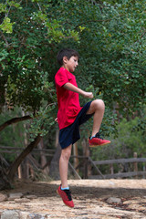 Cute boy jumping