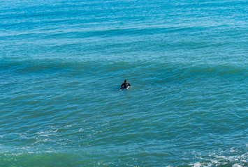 Man surfing in the Mediterranean Sea