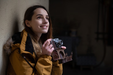 Photo of young tourist girl exploring streets of Baku. Moody photos of teenager girl visiting old city and taking photos of the city