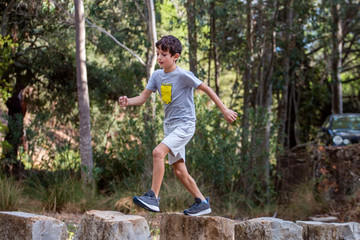 Cute boy outdoor running