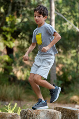 Cute boy outdoor running
