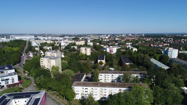 Aerial or Drone shot of Ingolstadt's Piusviertel (pius quarter) with housing estates in summertime with blue sky, Bavaria, Germany.