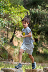 Cute boy outdoor running