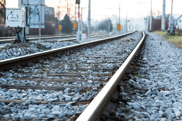 Fototapeta premium Railroad at the evening dusk somewhere rural