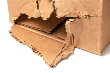 Torn cardboard box