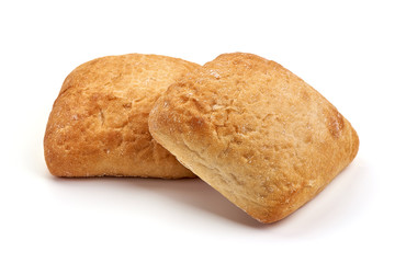Freshly baked flour bread, homemade buns, isolated on white background