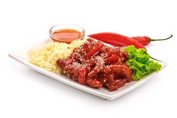 Kung Pao Chicken with rice prepared in wok, Chinese traditional food, isolated on white background