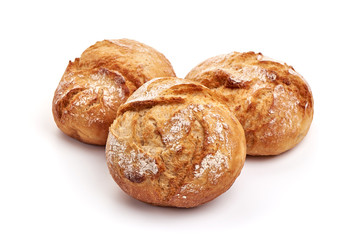 Freshly baked round bread loaf, isolated on white background