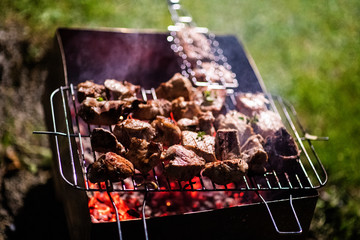 Juicy slices of meat prepare on fire. barbecue