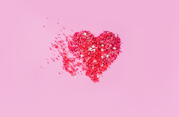 Heart on a pink background of small hearts.