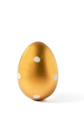 Golden colored easter egg isolated on white background. Happy Easter time.