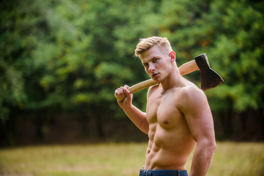You can do it. Lumberjack woodman sexy naked athletic torso. Masculine concept. Illegal logging. woodsman with axe in hand. muscular man with axe. sexy macho bare belly ax. bodybuilding concept