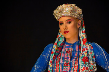 folk clothes and pearl crown on a woman 