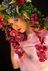 beautiful caucasian woman with vivid flower crown